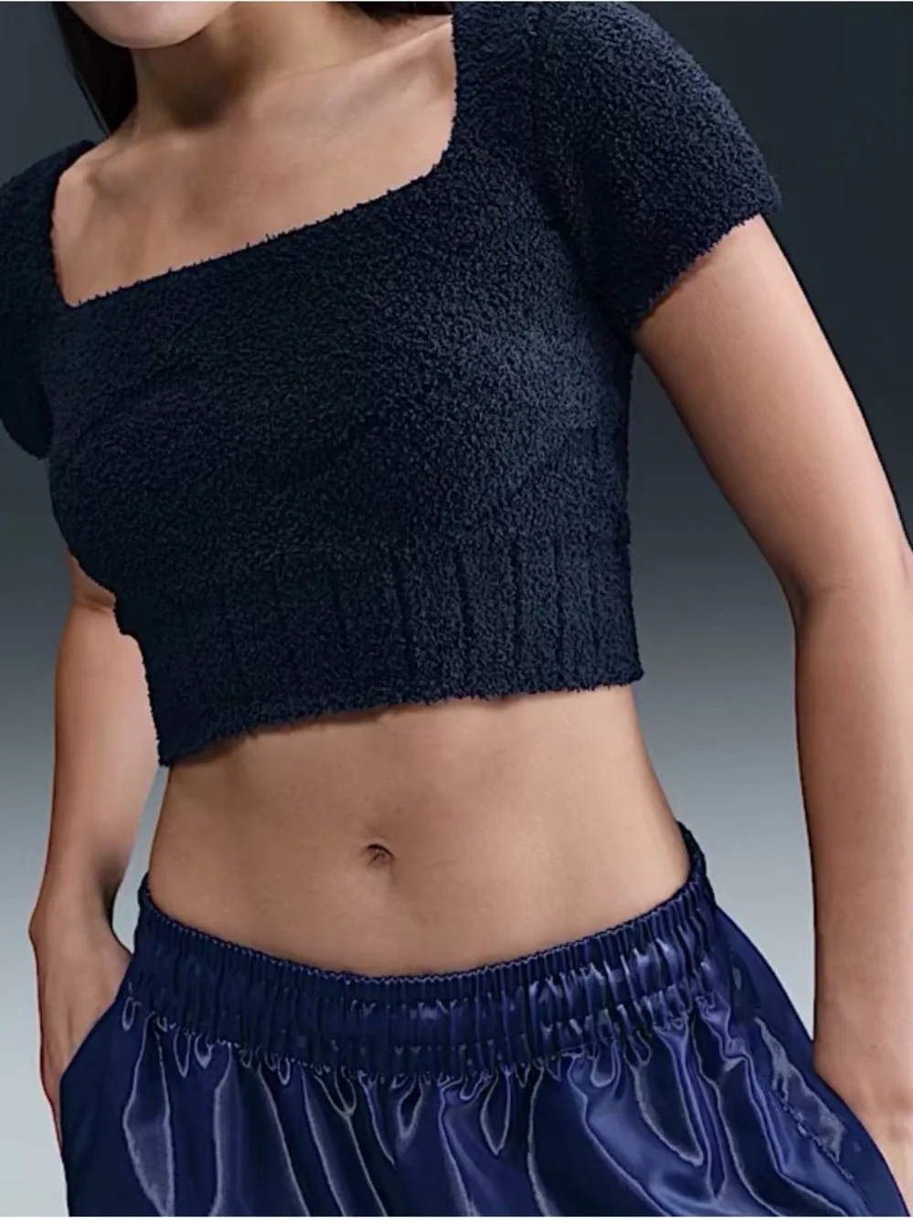 Nike Women’s Plush Knit Cropped Short Sleeve Top.